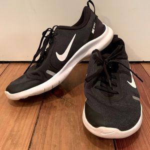 Black and white Nike tennis shoes